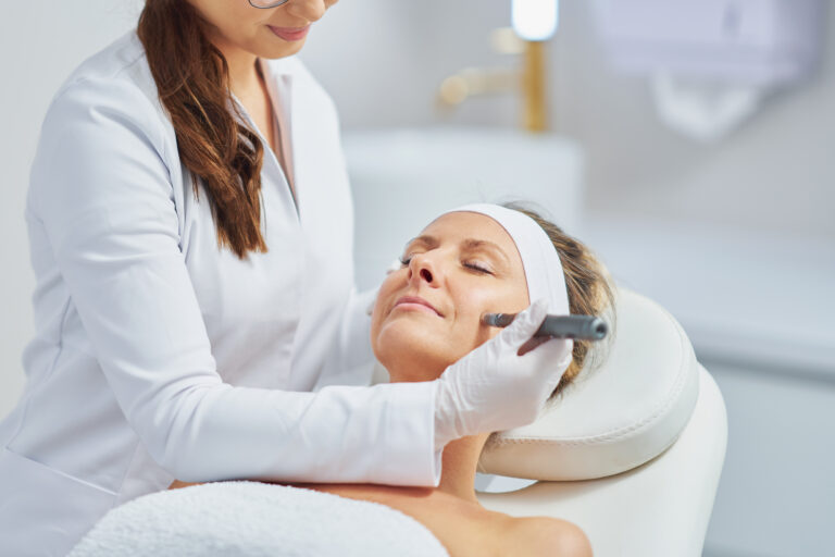 Woman in a beauty salon having needle mesotherapy treatment. High quality photo